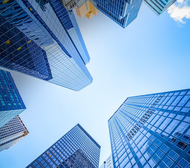 Skyscrapers towering against a clear blue sky.